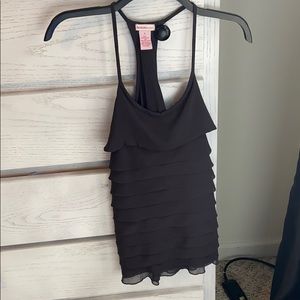 Dark gray tank top. Ripple effect design on front.